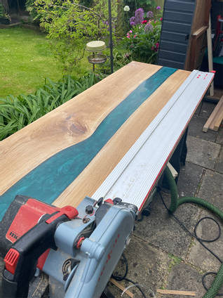 Oak and Resin River Table Trimming by EDC Carpentry